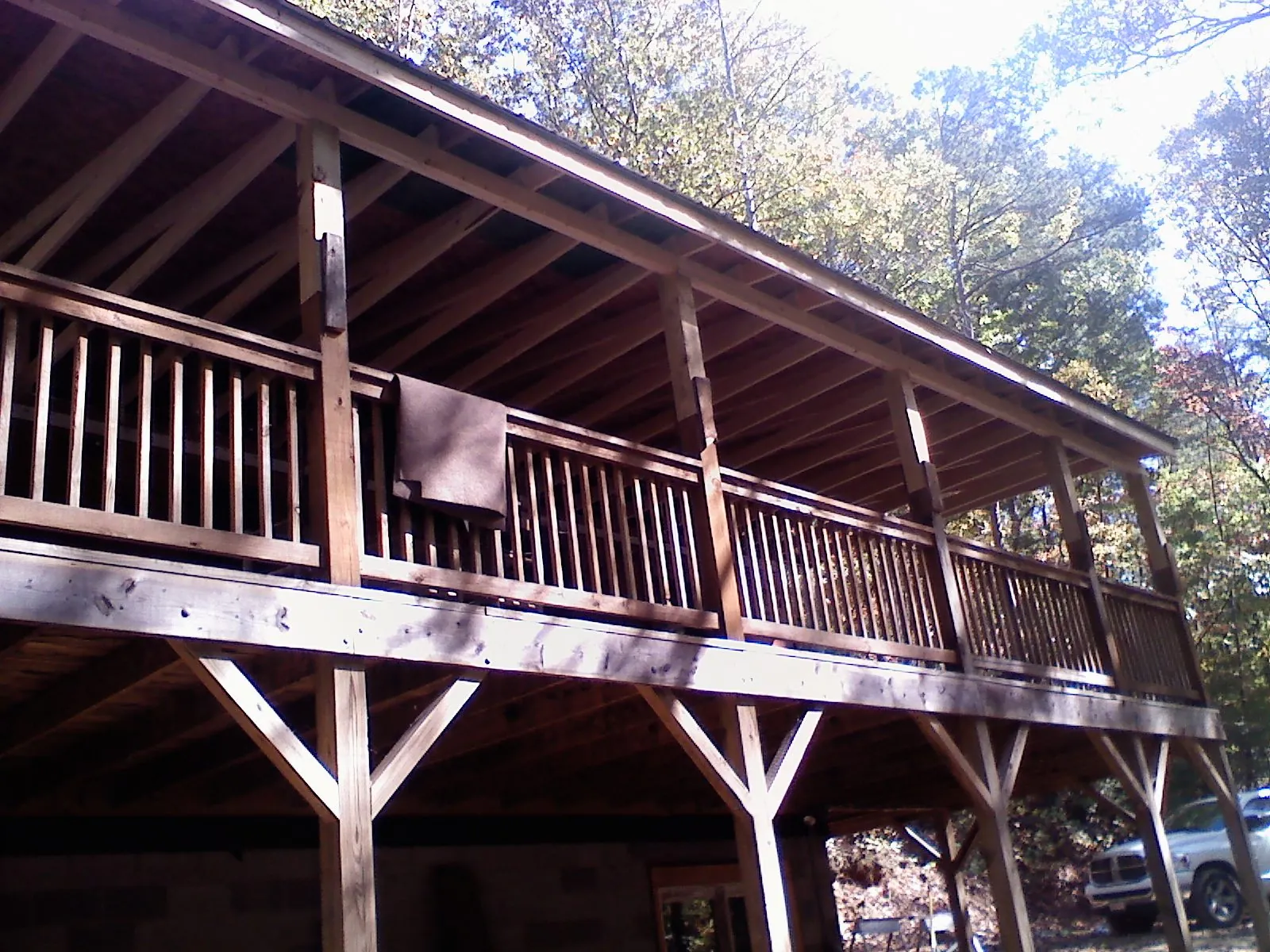 Timber framing under a new elevated porch and deck — Roof Leak Repair in Unionville by Roofing Brothers